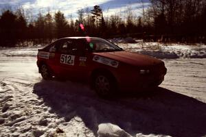 Jouni Pohjolainen / John Matikainen drift past spectators on SS1, Hungry 5, in their Nissan NX200.