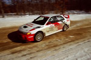 Bill Morton / Rob Walden at speed on SS5, Avery Lake I, in their Mitsubishi Lancer Evo IV.