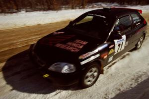 The Bryan Hourt / Pete Cardimen Honda Civic at speed on SS5, Avery Lake I.