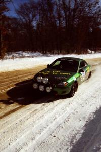 Tad Ohtake / Cindy Krolikowski at speed on SS5, Avery Lake I, in their Ford Escort ZX2.