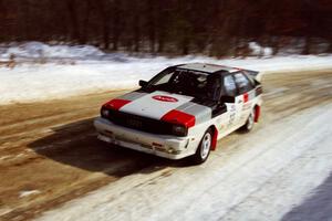 Jim Warren / Charles Bender at speed on SS5, Avery Lake I, in their Audi Quattro.