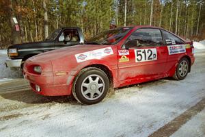 Jouni Pohjolainen / John Matikainen prepare to leave a stage start of SS5, Avery Lake I, in their Nissan NX200.