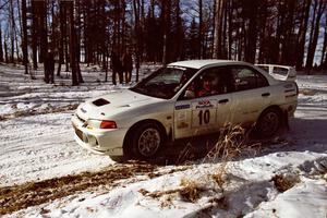 Pete Lahm / Matt Chester drift their Mitsubishi Lancer Evo IV through the hairpin on SS7, Ranch II.