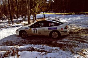 Chris Czyzio / Eric Carlson drift their Mitsubishi Eclips GSX through the hairpin on SS7, Ranch II.