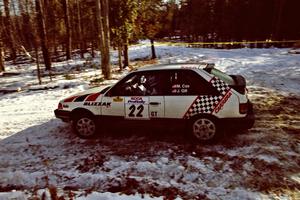 Mark Cox / Jim Gill take the hairpin on SS7, Ranch II, in their Mazda 323GTX.