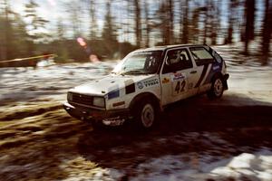 Eric Burmeister / Mark Buskirk VW GTI drifts through the hairpin on SS7, Ranch II.