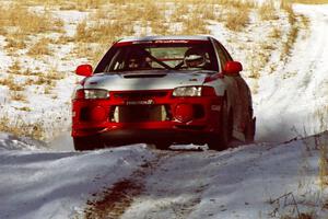 Garen Shrader / Doc Shrader at speed on SS7, Ranch II, in their Mitsubishi Lancer Evo IV.