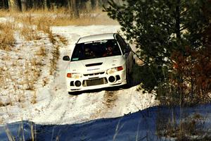 Pete Lahm / Matt Chester drift their Mitsubishi Lancer Evo IV at speed on SS7, Ranch II.