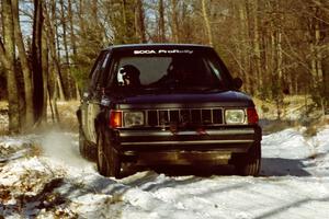 The Mark Utecht / Brenda Corneliusen Dodge Omni GLH-Turbo slows down for the hairpin on SS7, Ranch II.