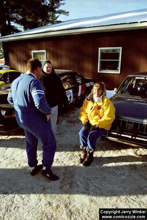 Mark Utecht and Brenda Corneliusen discuss pre-event strategy at their Dodge Omni GLH-Turbo at parc expose.