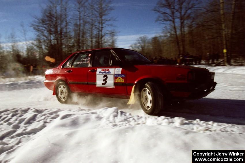 The Jon Kemp / Rod Hendricksen Audi 4000 Quattro drifts past spectators on SS1, Hungry 5. They were an early DNF.