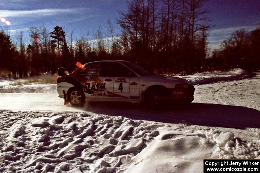 Garen Shrader / Doc Shrader on SS1, Hungry 5, in their Mitsubishi Lancer Evo IV.