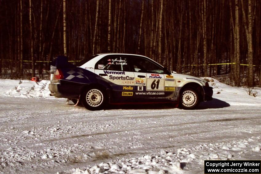 The Karl Scheible / Russ Hughes Mitsubishi Lancer Evo V comes out of the spectator corner on SS1, Hungry 5.