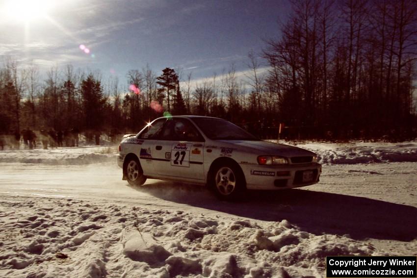 Greg Healey / John MacLeod drift past spectators on SS1, Hungry 5, in their Subaru Impreza.