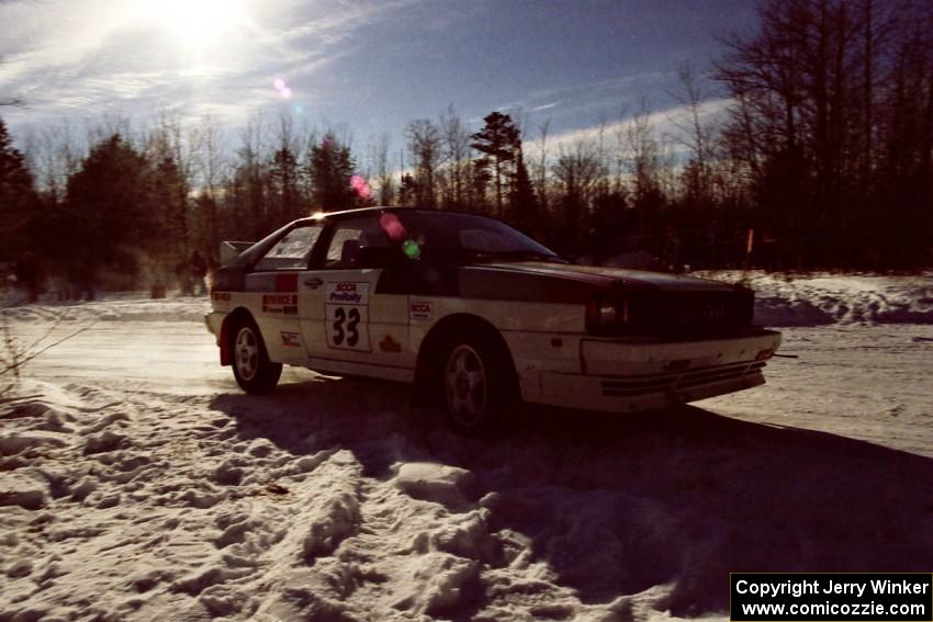 Jim Warren / Charles Bender drift through the spectator corner on SS1, Hungry 5, in their Audi Quattro.