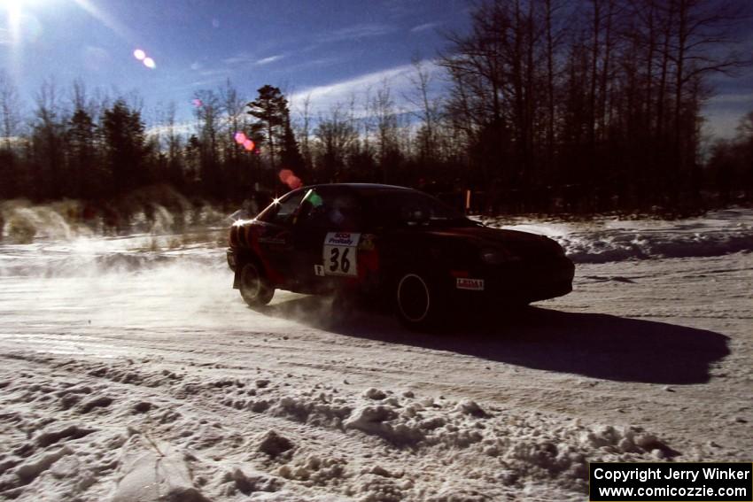 The Evan Moen / Kurt Winkelmann Chrysler Neon drifts through the spectator corner on SS1, Hungry 5.