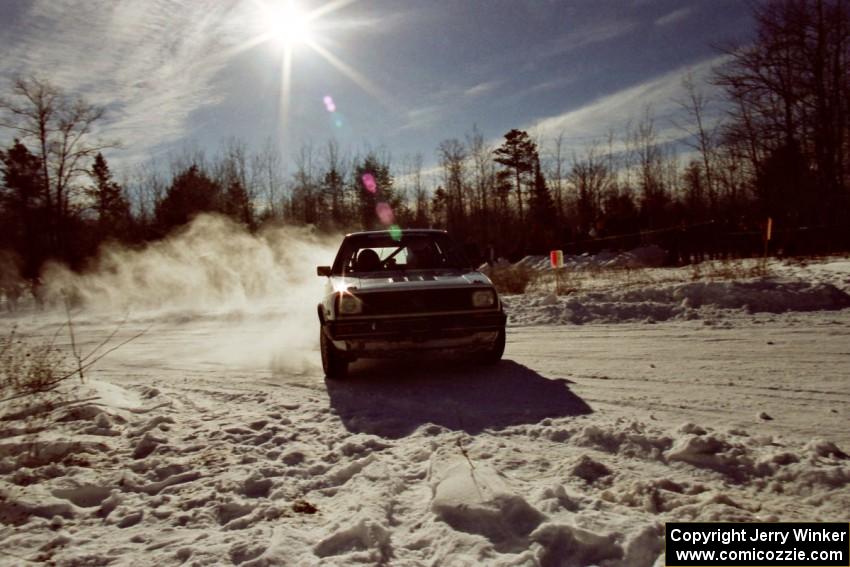 Doug Davenport / Lea Hoffa drift their VW Golf past spectators on SS1, Hungry 5.