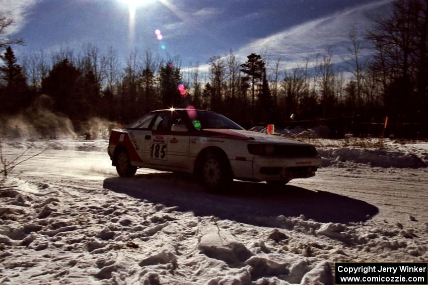 The Jon Bogert / Daphne Bogert Toyota Celica All-Trac drifts past spectators on SS1, Hungry 5.