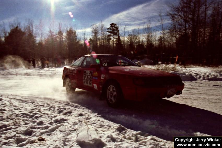 The Paul Dunn / Brian Jenkins Toyota Celica All-Trac drifts past spectators on SS1, Hungry 5.