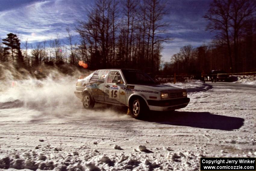 The Brad Hawkins / Adrian Wintle VW Jetta drifts past spectators on SS1, Hungry 5.