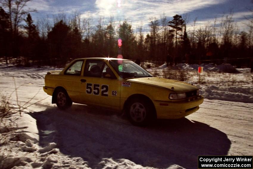 The Bruce Eddy / Jeff Shields Nissan Sentra SE-R drifts past spectators on SS1, Hungry 5.