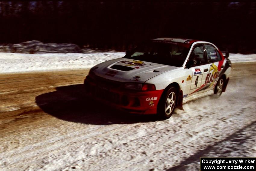 Garen Shrader / Doc Shrader at speed on SS5, Avery Lake I, in their Mitsubishi Lancer Evo IV.