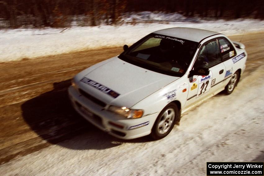 Greg Healey / John MacLeod at speed on SS5, Avery Lake I, in the morning in their Subaru Impreza.