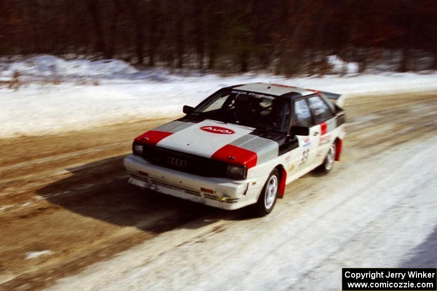 Jim Warren / Charles Bender at speed on SS5, Avery Lake I, in their Audi Quattro.