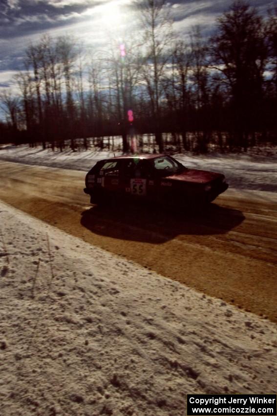 Brian Vinson / Luke Stuart drift through a fast left-sweeper on SS5, Avery Lake I, in their VW GTI.