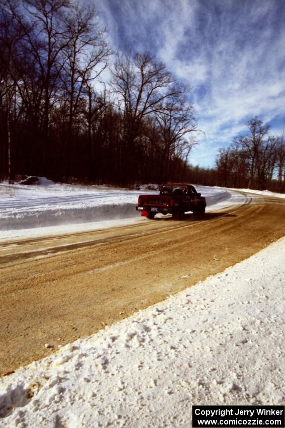 Scott Carlborn / Dale Dewald at speed on SS5, Avery Lake I, in their Jeep Comanche before noon.