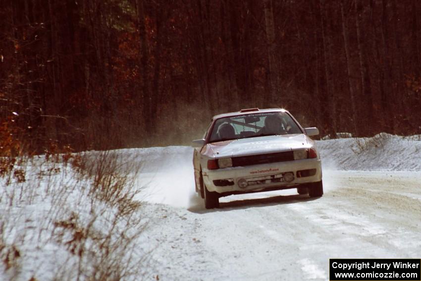 The Jon Bogert / Daphne Bogert Toyota Celica All-Trac at speed on SS5, Avery Lake I, in the late morning.