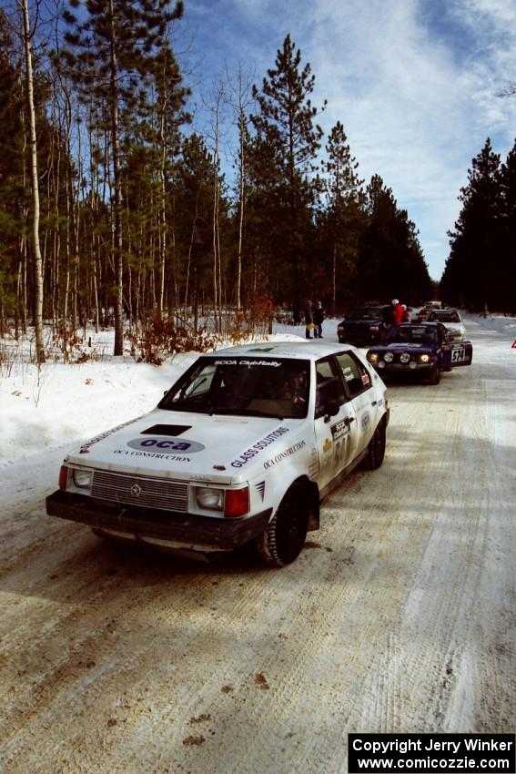 John Zoerner / John Shepski pull up to the start of SS5, Avery Lake I, in their Dodge Omni GLH-Turbo.