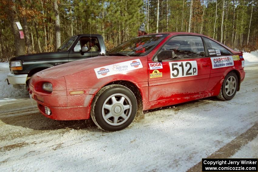 Jouni Pohjolainen / John Matikainen prepare to leave a stage start of SS5, Avery Lake I, in their Nissan NX200.