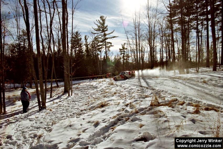 Bill Morton / Rob Walden set up for the hairpin on SS7, Ranch II, in their Mitsubishi Lancer Evo IV.