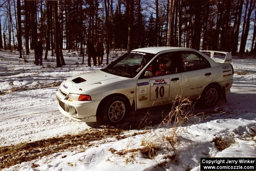 Pete Lahm / Matt Chester drift their Mitsubishi Lancer Evo IV through the hairpin on SS7, Ranch II.