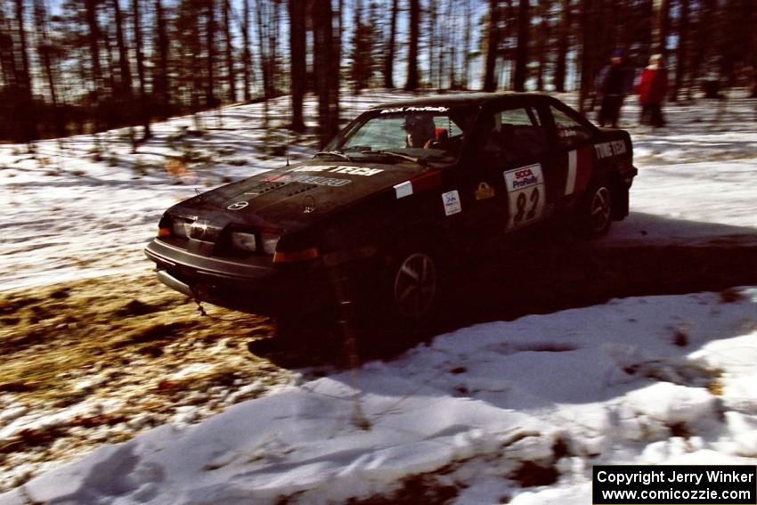 The Mike Hurst / Rob Bohn Pontiac Sunbird Turbo take the hairpin on SS7, Ranch II.