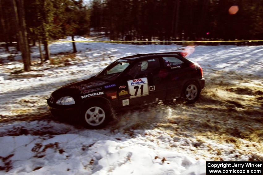 The Bryan Hourt / Pete Cardimen Honda Civic drifts nicely through the hairpin on SS7, Ranch II.