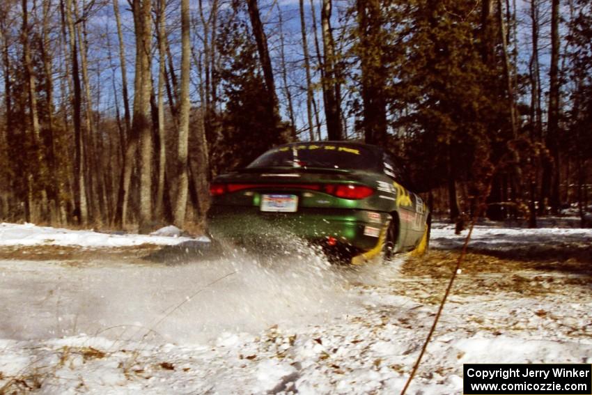 Tad Ohtake / Cindy Krolikowski attack the hairpin on SS7, Ranch II, in their Ford Escort ZX2.