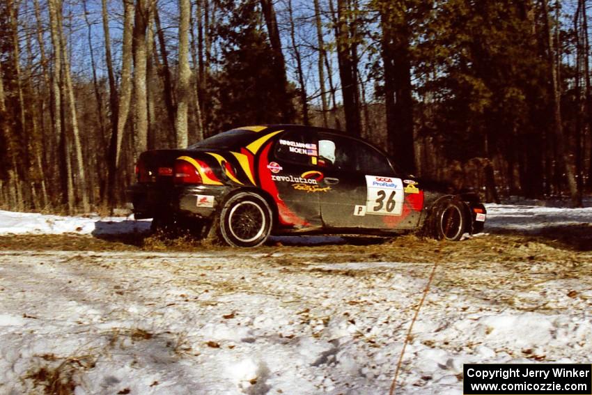 The Evan Moen / Kurt Winkelmann Chrysler Neon takes the hairpin on SS7, Ranch II.