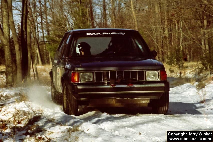 The Mark Utecht / Brenda Corneliusen Dodge Omni GLH-Turbo slows down for the hairpin on SS7, Ranch II.