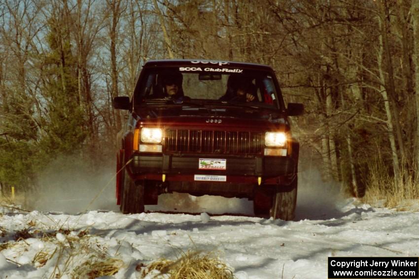 Scott Carlborn / Dale Dewald set up for the hairpin on SS7, Ranch II, in their Jeep Comanche.