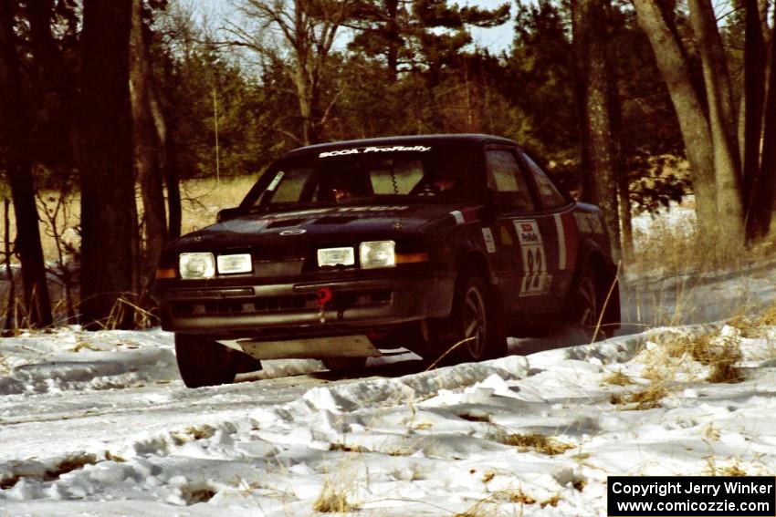 The Mike Hurst / Rob Bohn Pontiac Sunbird Turbo at speed on SS7, Ranch II.