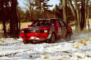 The Sylvester Stepniewski / Adam Pelc Audi 4000 Quattro slows for the hairpin on SS7, Ranch II.