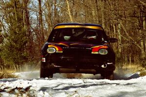 The Evan Moen / Kurt Winkelmann Chrysler Neon sets up for the hairpin on SS7, Ranch II.