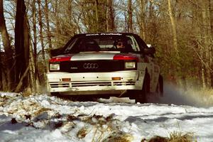 Jim Warren / Charles Bender set up for the hairpin on SS7, Ranch II, in their Audi Quattro.
