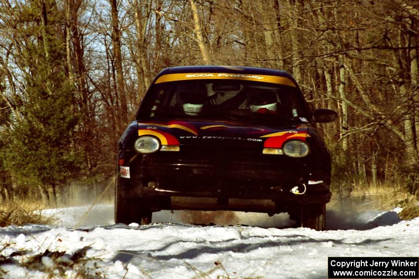 The Evan Moen / Kurt Winkelmann Chrysler Neon sets up for the hairpin on SS7, Ranch II.