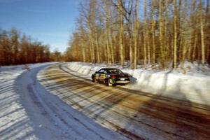Tad Ohtake / Cindy Krolikowski take a fast sweeper in their Ford Escort ZX2 on SS9, Avery Lake II.