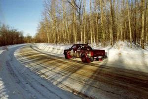 Scott Carlborn / Dale Dewald drift through a fast sweeper on SS9, Avery Lake II, in their Jeep Comanche.