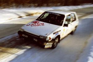 The Mark Brown / Ole Holter Toyota Corolla FX-16 at speed on SS9, Avery Lake II.