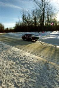 The Carlos Arrieta, Sr. / Dick Casey Audi 4000 Quattro at speed on SS9, Avery Lake II, just before sundown.